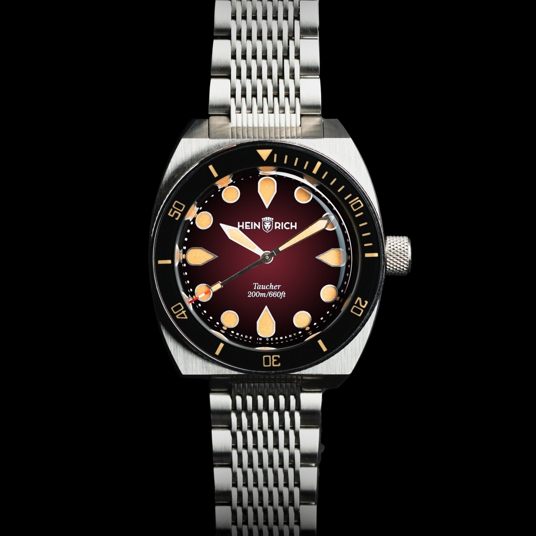 Heinrich Taucher orologio rosso lume arancione automatico